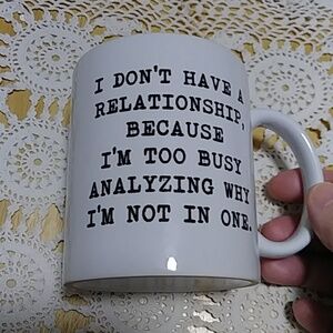 Funny coffee cup on relationships